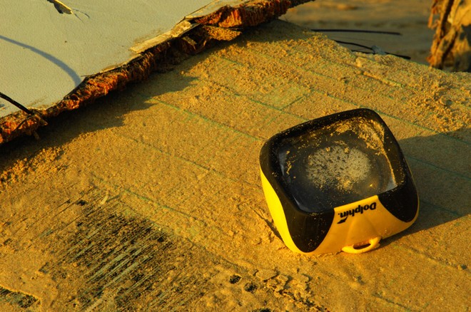 Debris from Shockwave 5, stacked by local Surf Lifesavers for collection after washing up on Corrimal Beach    <br />
   © Peter Andrews http://www.outimage.net